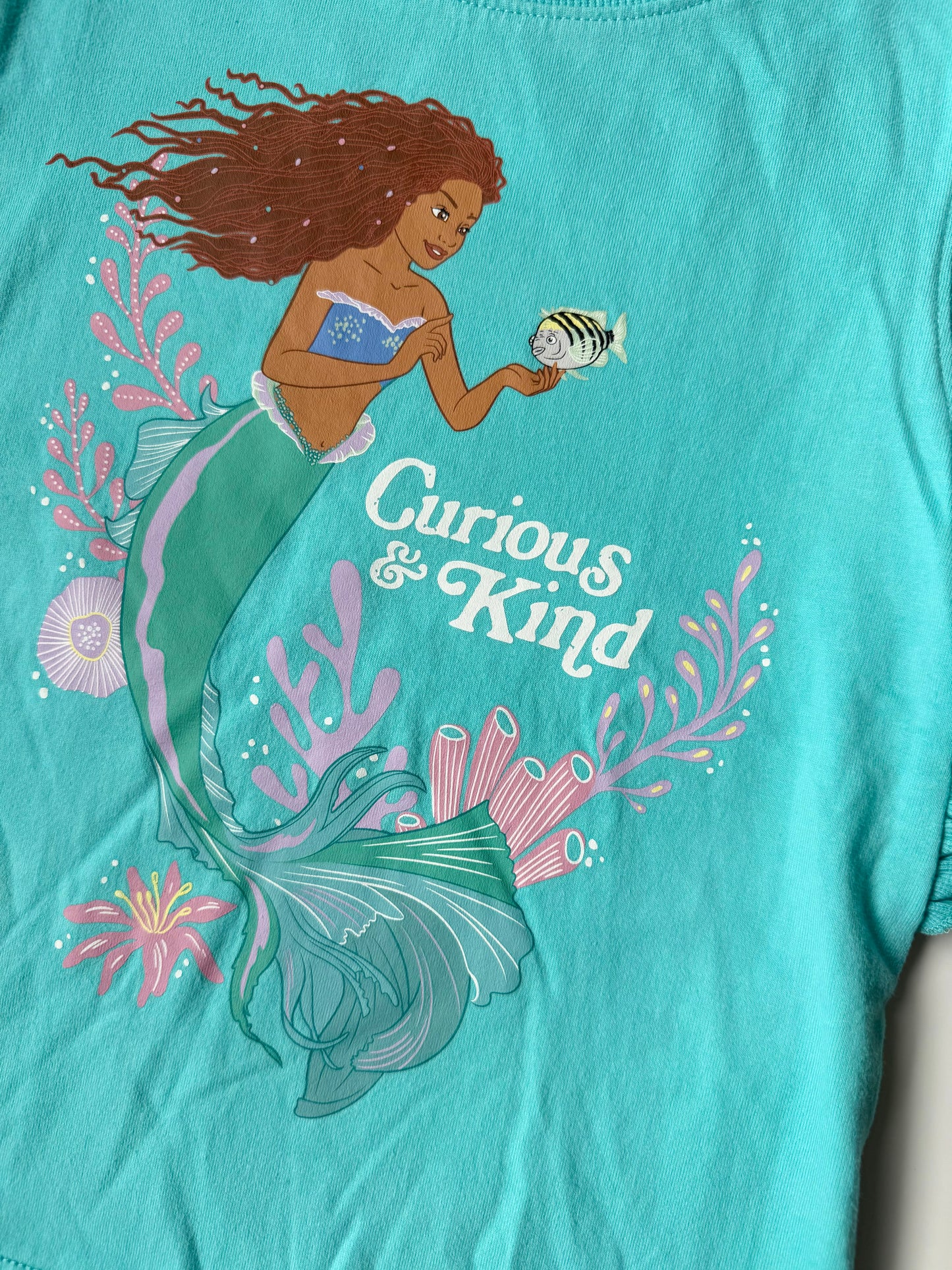 The Disney Store Blue Ariel “Curious & Kind” Sleeveless Ruffle Shirt (7/8 Years)