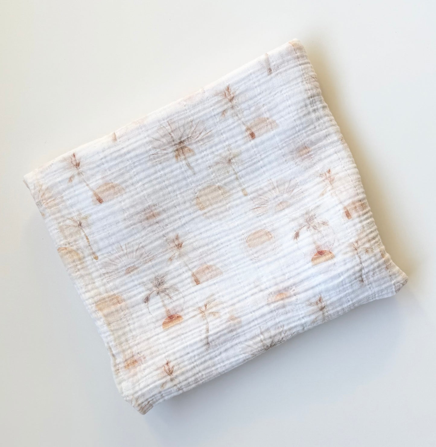 Light Orange Suns & Palm Trees Muslin Swaddle Blanket