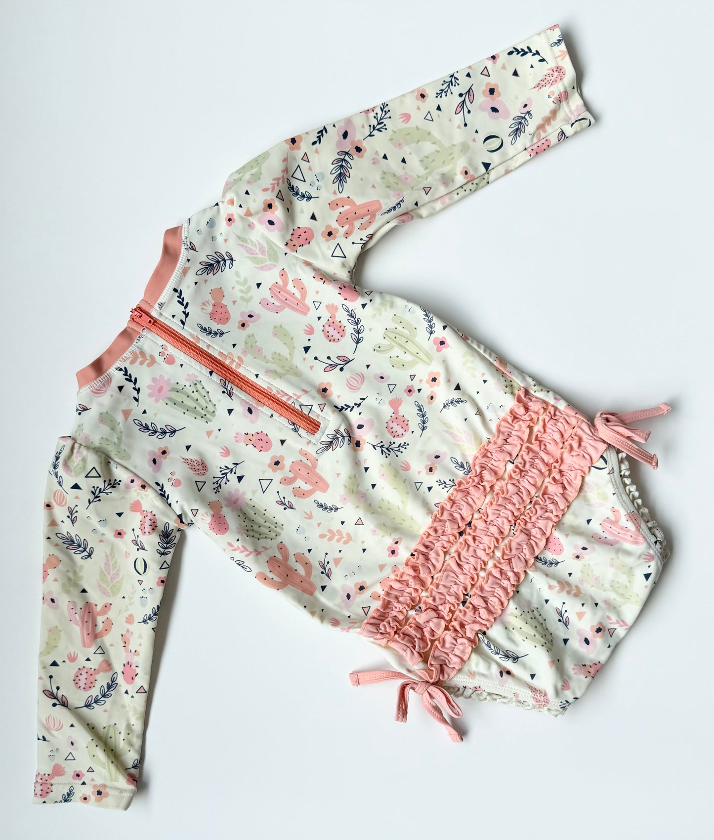 Ruffle Butts Light Pink Desert Long Sleeve One Piece Swimsuit (18-24 Months)