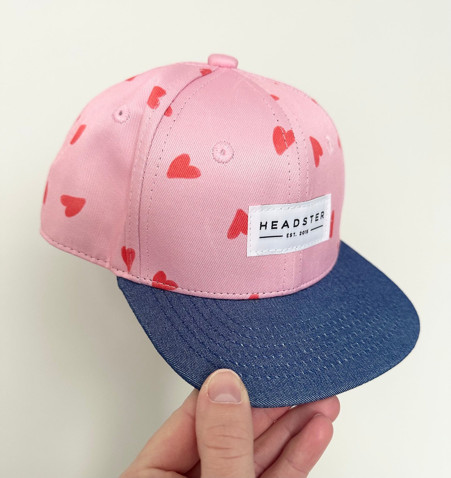 Headster Pink Hearts Snapback Hat (48CM)