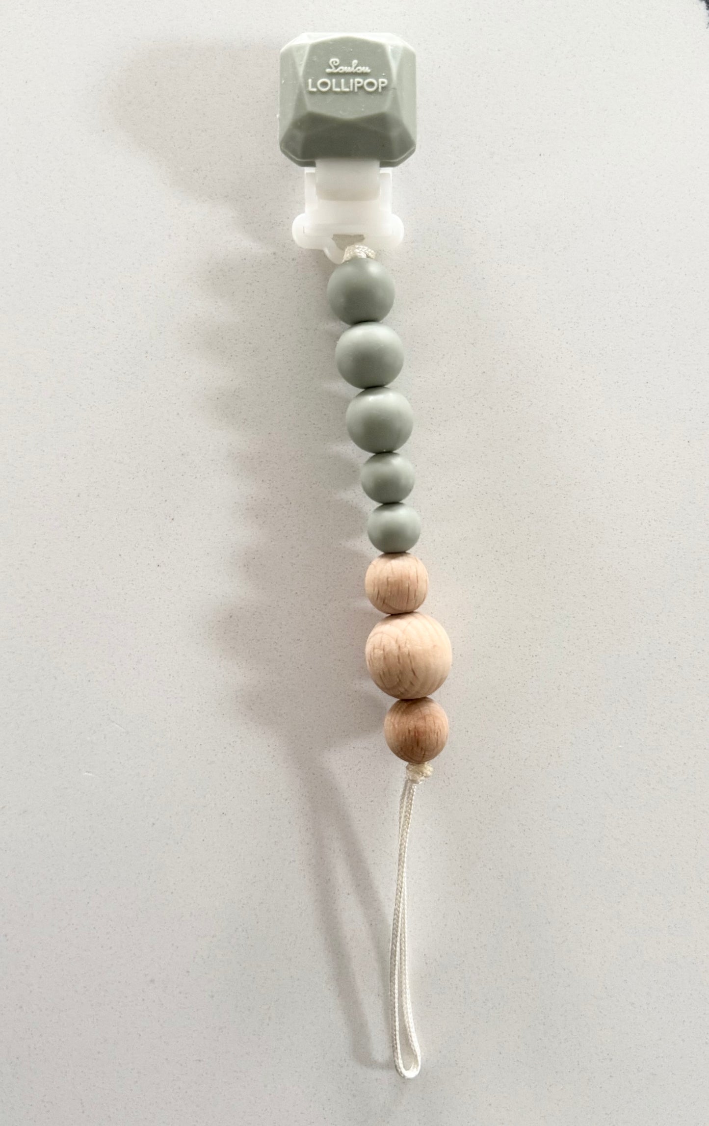 LouLou Lollipop Colour Pop Silicone & Wood
Pacifier Clip in Silver Sage