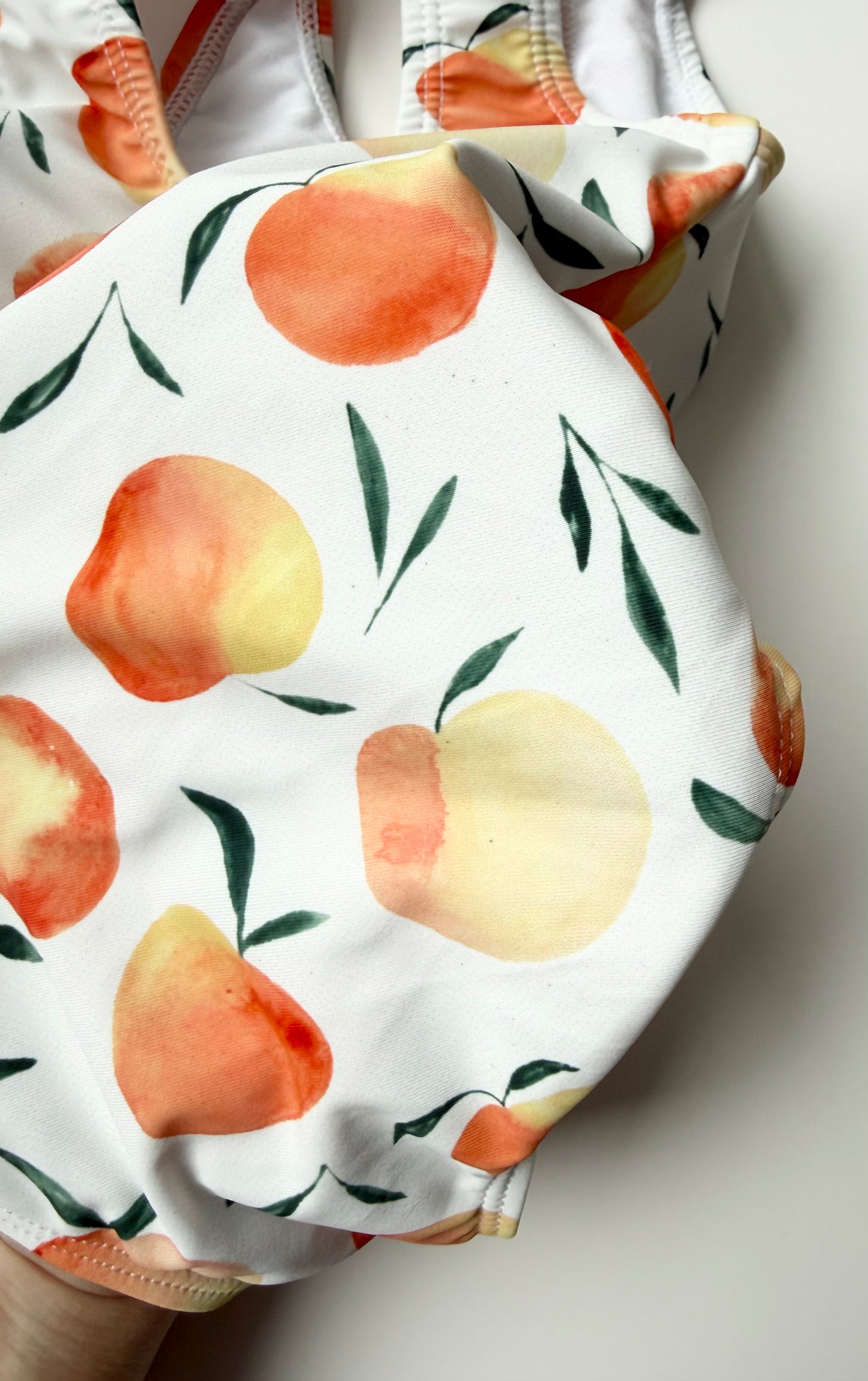 Current Tyed “The Ella” Peaches Ruffle Shoulder One Piece Swimsuit (6-12 Months)